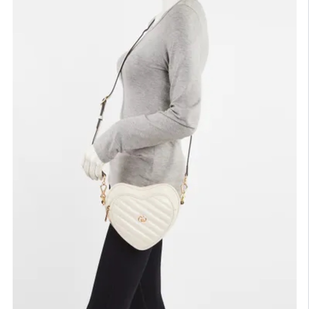 New! GUCCI
White Quilted Leather
Interlocking G Mini Heart
Crossbody Bag - Picture 9 of 12